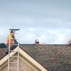 Evolution Roofing crew completing a roofing project — photo 11