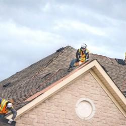 Evolution Roofing crew completing a roofing project — photo 12