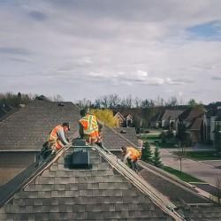Evolution Roofing crew completing a roofing project — photo 18