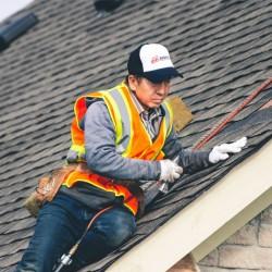 Evolution Roofing crew completing a roofing project — photo 3