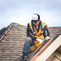 Evolution Roofing crew completing a roofing project — photo 5
