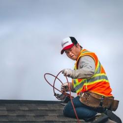 Evolution Roofing crew completing a roofing project — photo 6