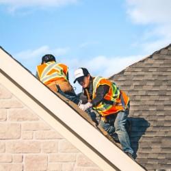 Evolution Roofing crew completing a roofing project — photo 7