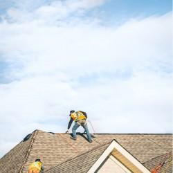 Evolution Roofing crew completing a roofing project — photo 9